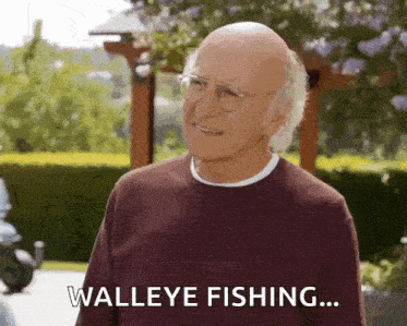 a man wearing glasses and a sweater says walleye fishing ...