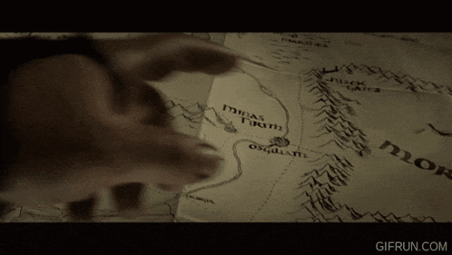 a person is pointing at a map that says ' door ' on it