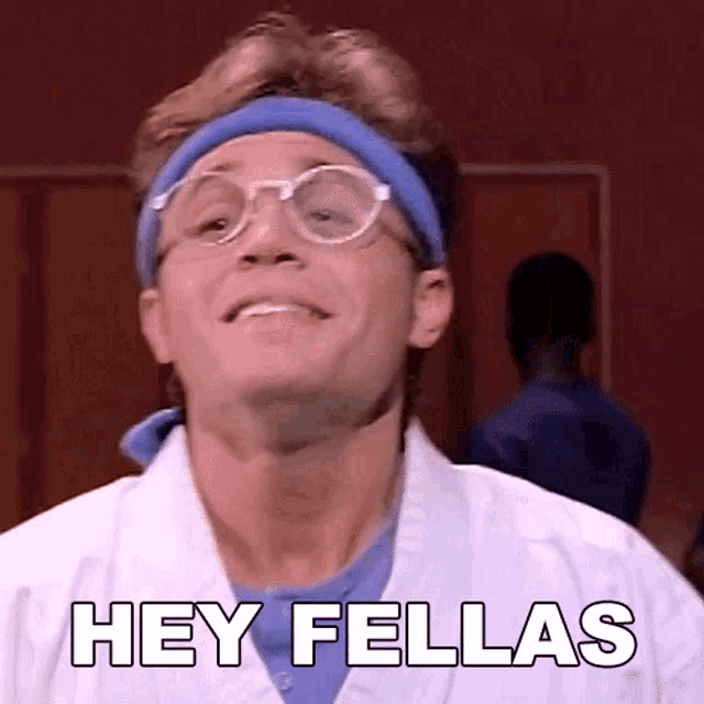 a man with glasses and a headband says " hey fellas "