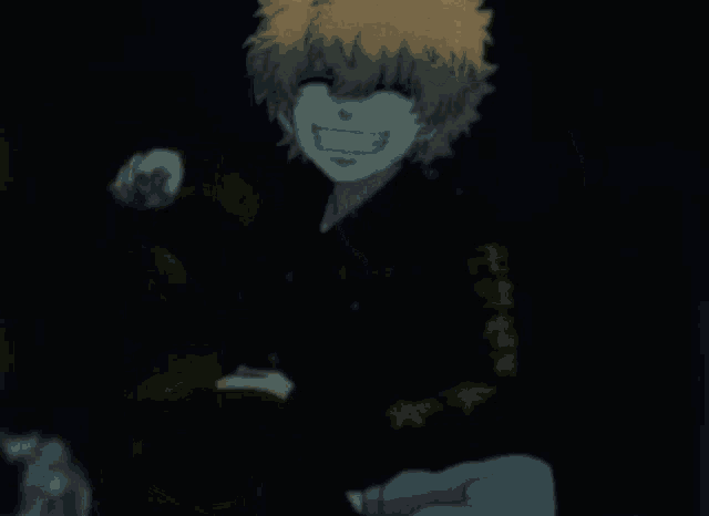 a blurry picture of a person with a yellow hair and a black shirt
