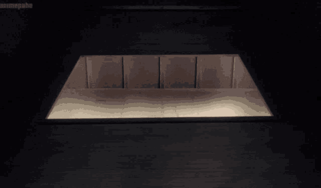 a girl with blonde hair is peeking out of a dark room