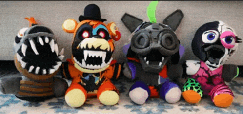 five nights at freddy 's stuffed toys are sitting on a carpet