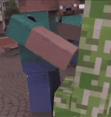 two minecraft characters are standing next to each other on a cobblestone street