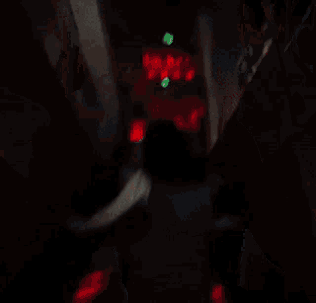 a blurry picture of a woman dancing in a room