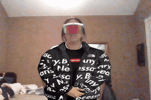 a person wearing a jacket that says y.b. on it