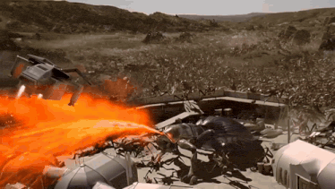 a giant ant is being attacked by a helicopter with orange flames coming out of it