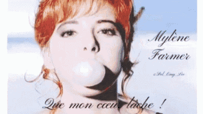 a poster of a woman blowing a bubble with the name mylene farmer on it