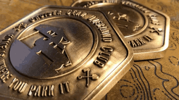 a coin that says disneyland club park on it