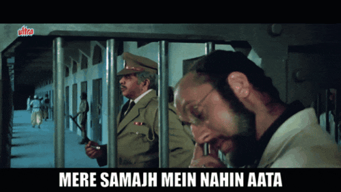 a man in a prison cell with the words mere samajh mein nahin aata above him