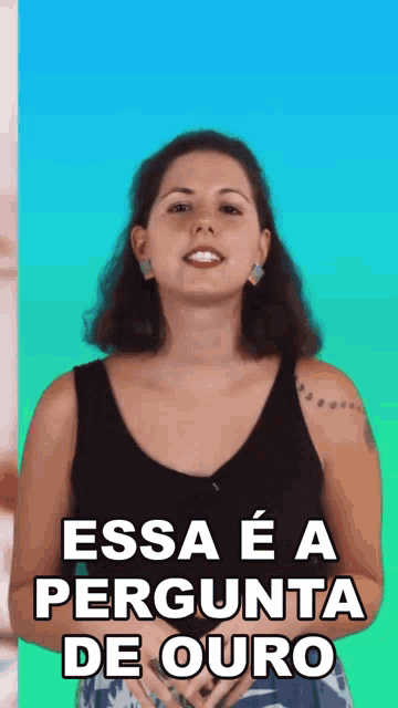 a woman in a black tank top with the words " essa e a pergunta de ouro " below her