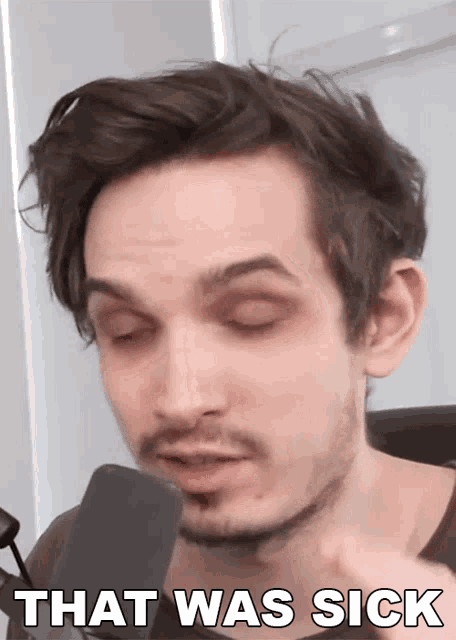 a close up of a man 's face with the words that was sick written below him