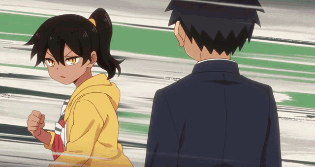 a boy and a girl are standing next to each other