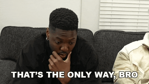 a man sitting on a couch with the words that 's the only way bro