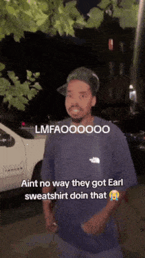 a man wearing a hat and a blue shirt says aint no way they got earl sweatshirt doin that