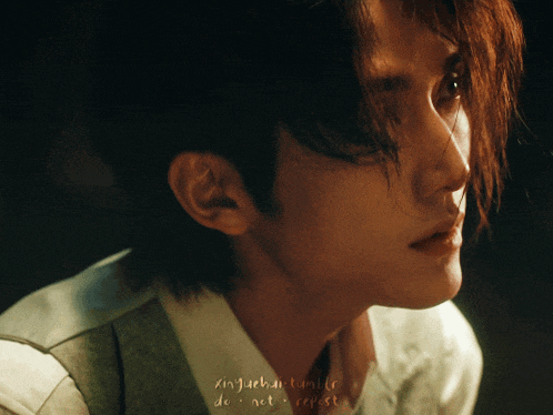 a close up of a person 's face with a watermark that says ' xinjuchan tumblr do not repost '