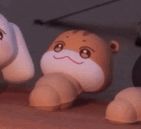 a close up of a stuffed animal with its mouth open