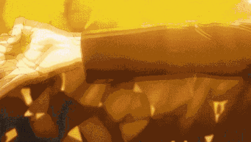 a close up of a person 's hand on a yellow surface
