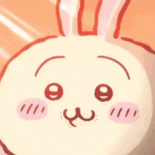 a close up of a cartoon rabbit 's face with bunny ears .