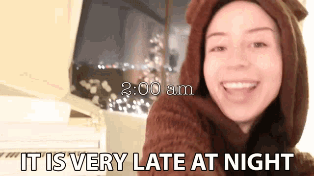 a woman in a bear costume says it is very late at night at 2:00 am