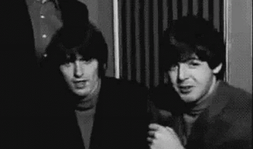 Paul Mccartney George Harrison The Beatles GIF - Paul Mccartney George Harrison The Beatles Wink GIFs