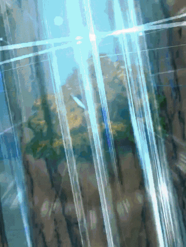 a painting of a waterfall with a blue background