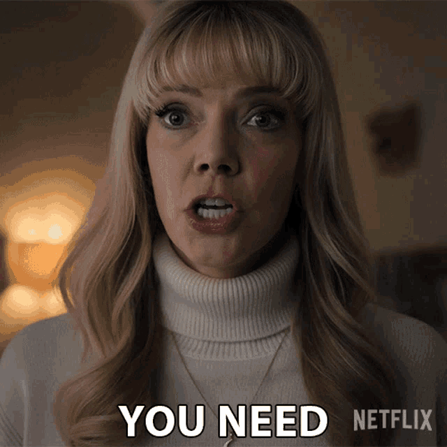 a woman in a white turtleneck sweater says " you need "