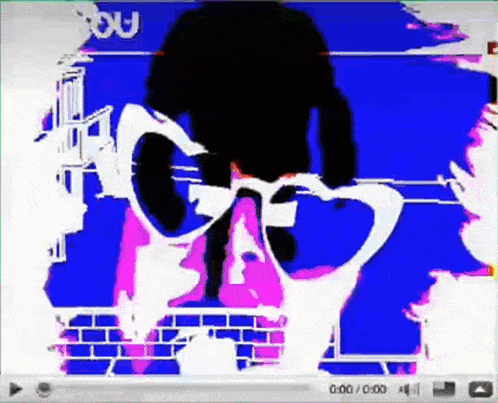 a video of a person wearing heart shaped sunglasses is being played