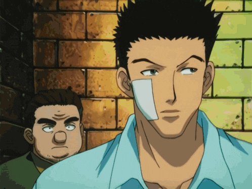 a man with a bandage on his face looks at another man