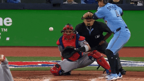 a baseball player in a blue jersey with the number 1 on it