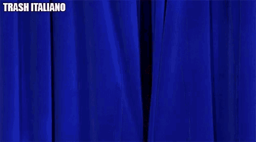 a woman is peeking out from behind a blue curtain and the words trash italiano are above her