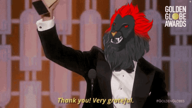 a lion in a tuxedo holds up a trophy and says " thank you very grateful "