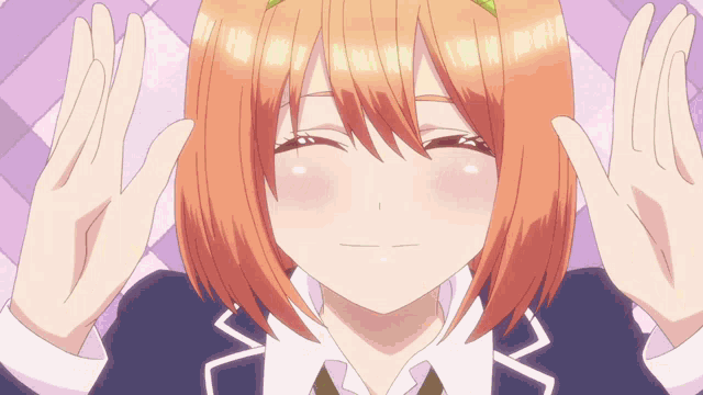 a girl with orange hair is smiling and making a face with her hands