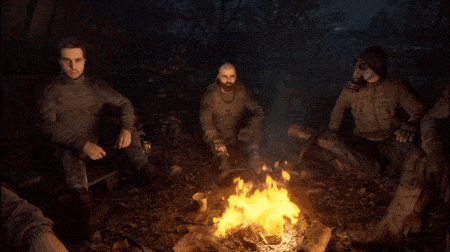 a group of men are sitting around a fire in the woods
