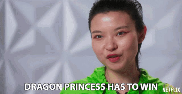 a woman in a green shirt says dragon princess has to win