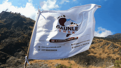 a white flag with gauntle trek on it