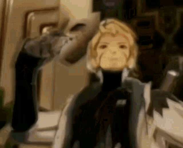 a cartoon character is standing in front of a mirror in a room and looking at the camera .