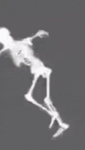 a black and white photo of a skeleton with arms and legs flying in the air .