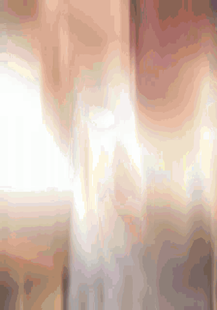 a blurred image of a person 's feet with a few white spots on them