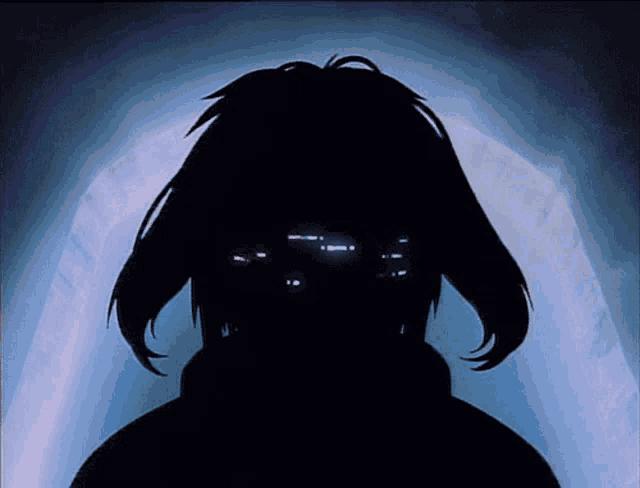 a silhouette of a person 's face with a blue background
