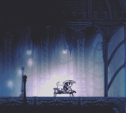 a cartoon character sitting on a bench in a dark room