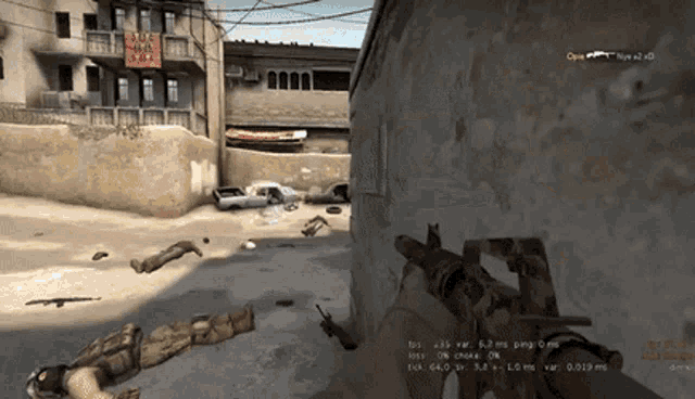 a soldier is laying on the ground in a video game while holding a rifle