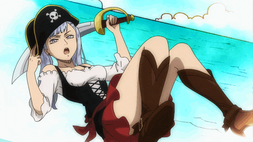 a woman in a pirate costume is laying on the ground holding a sword
