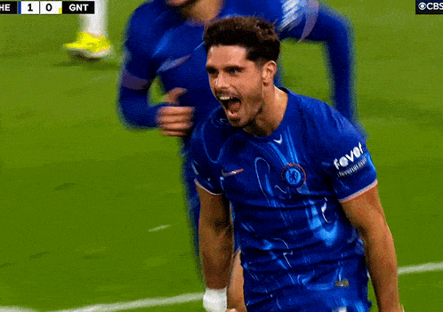 a man in a blue shirt with the word fever on the sleeve