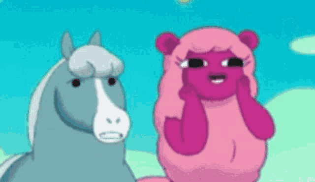 a horse and a sheep are looking at each other