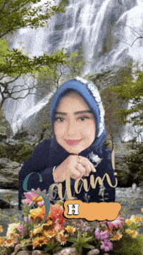 a picture of a woman with a waterfall in the background and the letter h in the corner