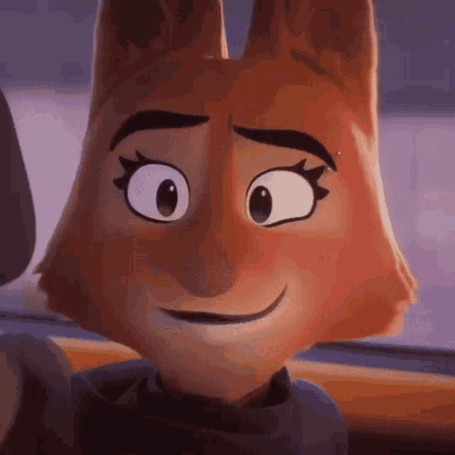 a close up of a cartoon fox 's face with a smile on it 's face .