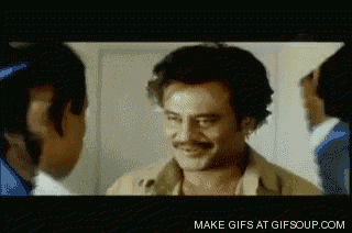 a man with a mustache is smiling in a gif that says make gifs at gifsoup.com on the bottom