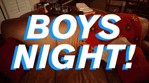 a couch with a blanket on it and the words boys night on it