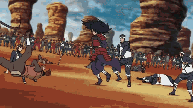 a group of anime characters are fighting each other in a desert