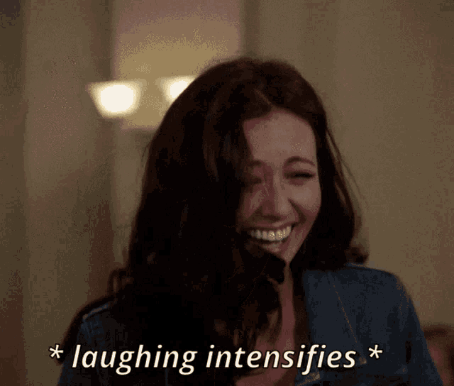 a woman is laughing intensely with the words laughing intensifies below her